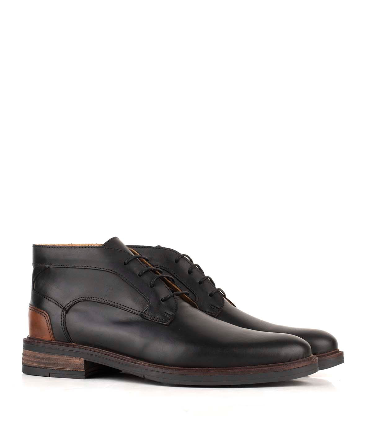 Bota de cuero lisa con cordones y detalle combinado — imagen 5